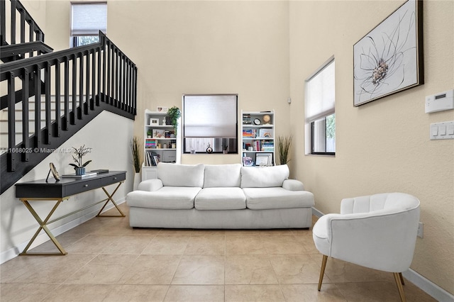 living room with light tile patterned floors