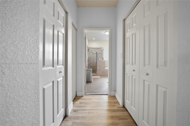 hall featuring light hardwood / wood-style flooring