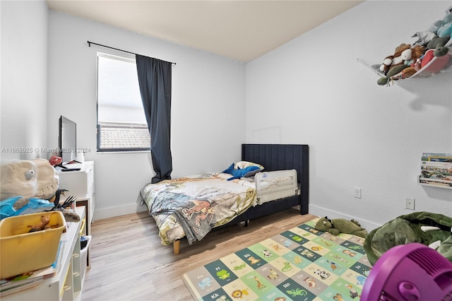 bedroom featuring light wood-type flooring