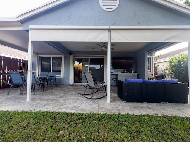 view of patio / terrace featuring fence, an outdoor living space, outdoor dining space, visible vents, and ceiling fan