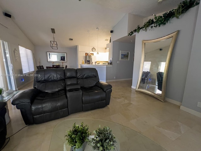 living room with vaulted ceiling