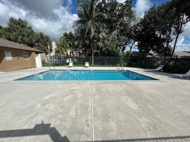 view of pool with a patio