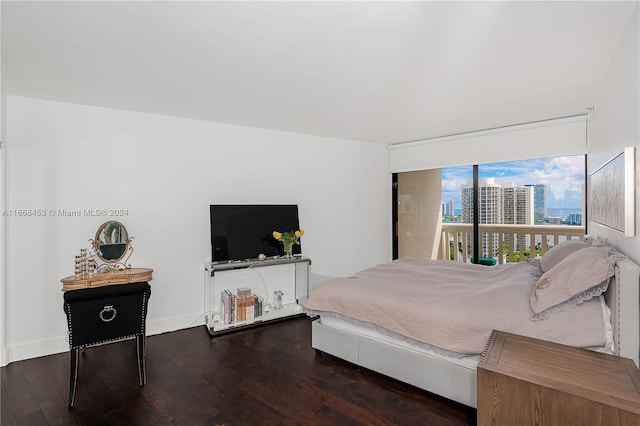 bedroom featuring dark wood-type flooring