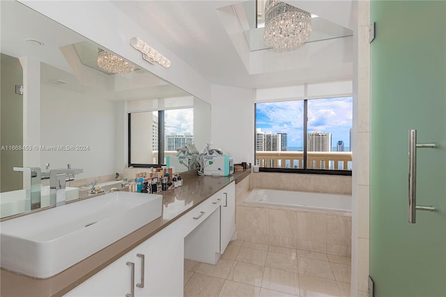 bathroom with vanity, tiled bath, and tile patterned floors