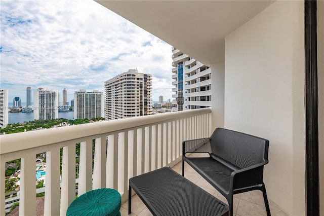 balcony featuring a water view