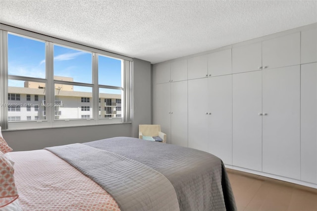 bedroom featuring a textured ceiling