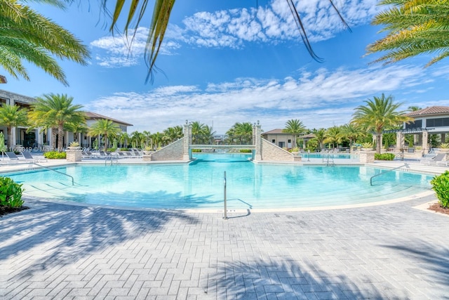 view of swimming pool featuring a patio