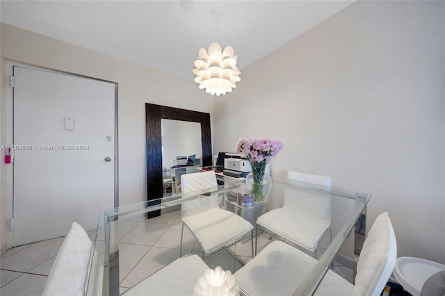 dining area with an inviting chandelier and light tile patterned floors