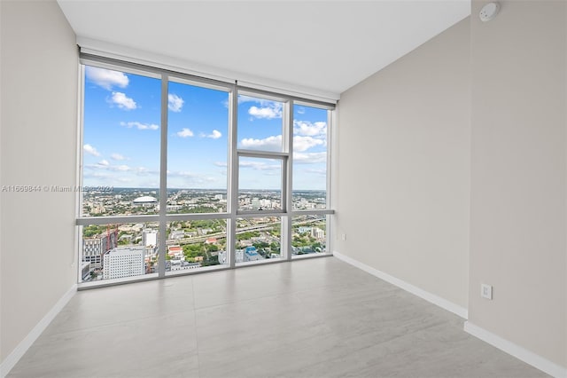 empty room with floor to ceiling windows