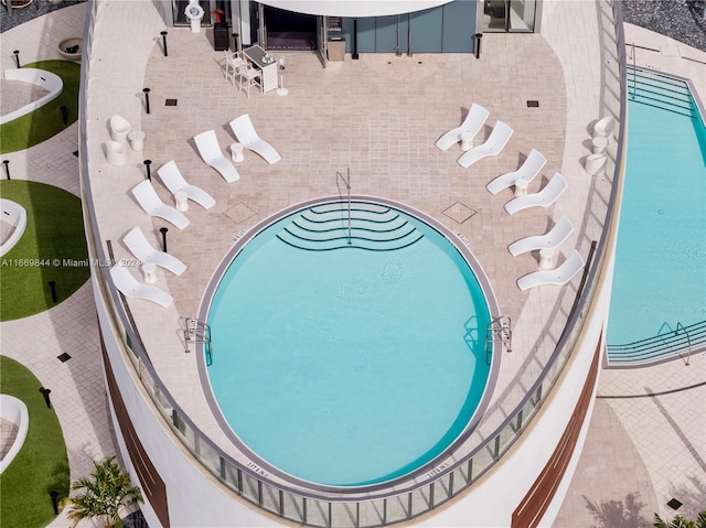 view of pool with a patio