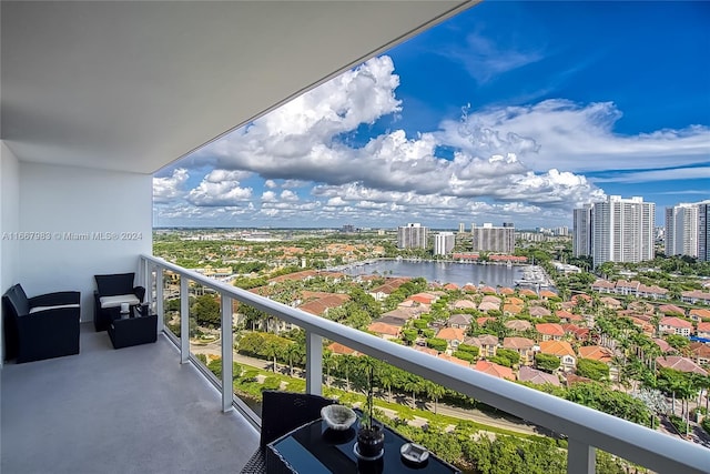 balcony featuring a water view