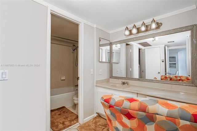 full bathroom featuring vanity, tile patterned flooring, shower / tub combination, ornamental molding, and toilet