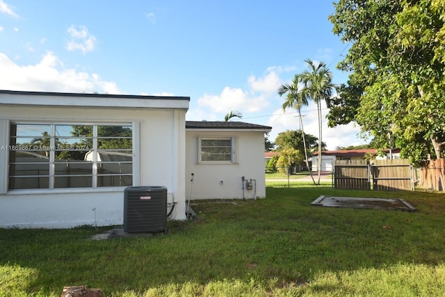 view of yard featuring central AC