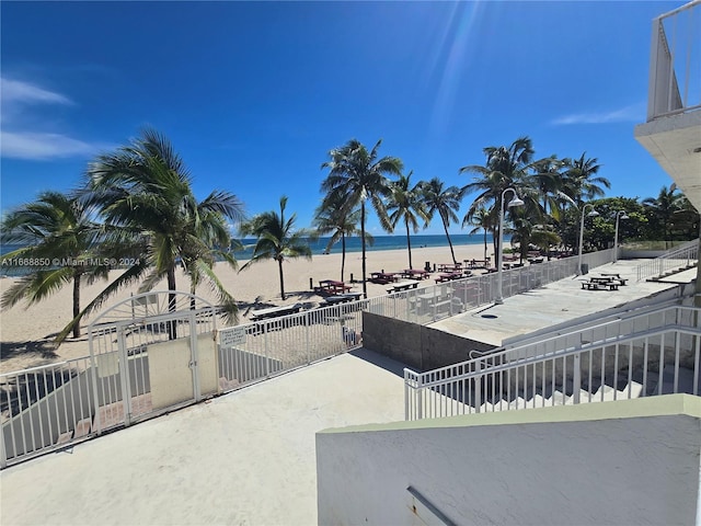 view of patio with a water view