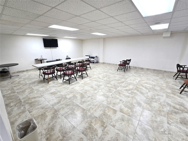 dining room with a paneled ceiling