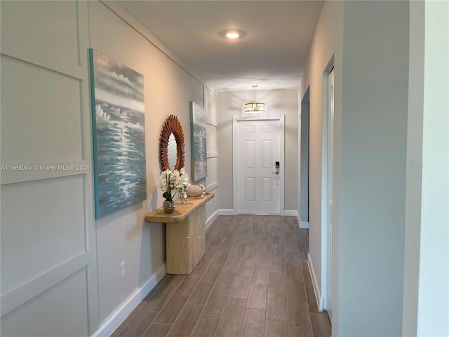 corridor featuring dark hardwood / wood-style floors