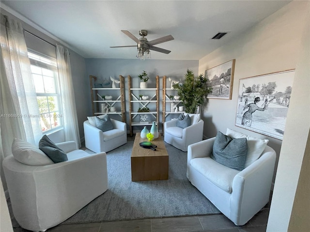 living room featuring ceiling fan