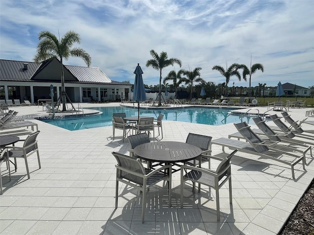 pool featuring a patio area