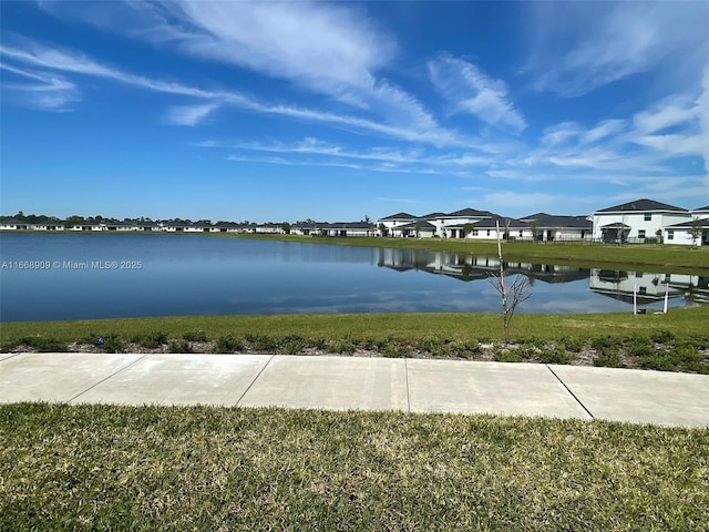 view of water feature with a residential view