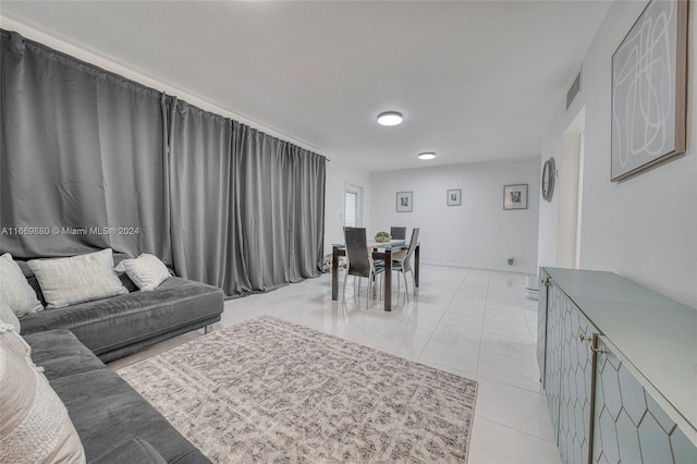 living room featuring light tile patterned floors