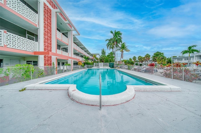 view of pool featuring a patio area