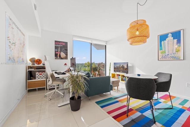 interior space featuring expansive windows and tile patterned flooring