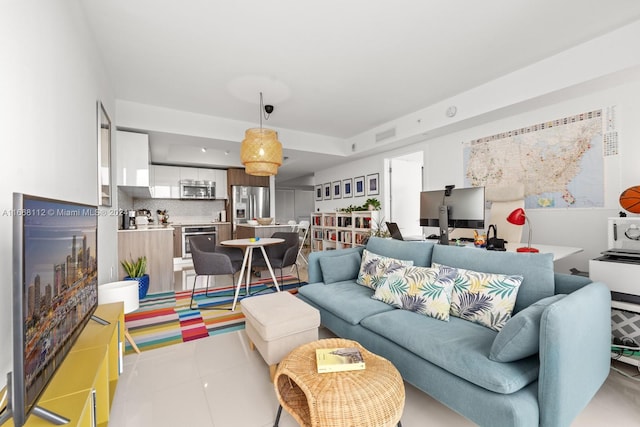 living room featuring light tile patterned floors