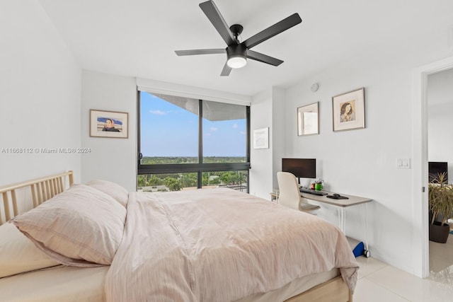 tiled bedroom with ceiling fan