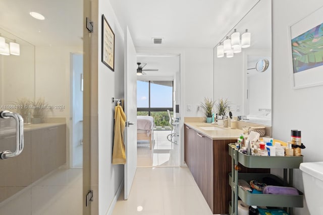 bathroom featuring vanity, ceiling fan, tile patterned floors, and an enclosed shower