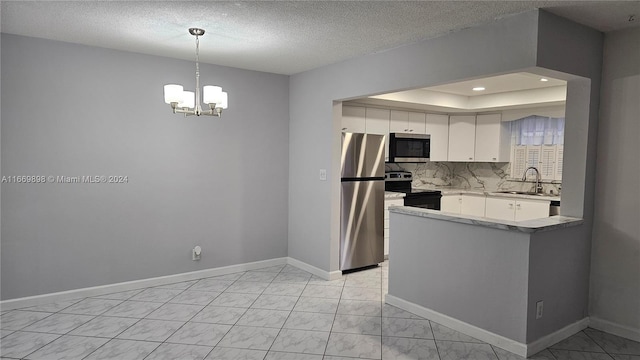 kitchen with sink, a textured ceiling, decorative light fixtures, white cabinetry, and stainless steel appliances