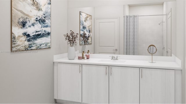 bathroom featuring vanity and walk in shower