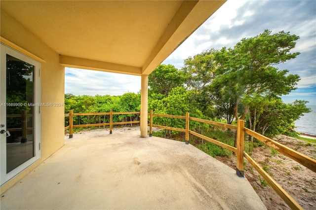 view of patio / terrace with a water view