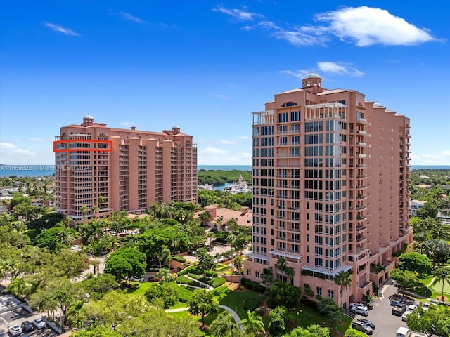 view of building exterior with a water view