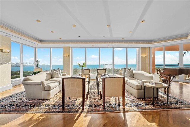 sunroom with a water view