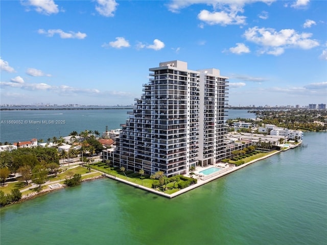 bird's eye view with a water view