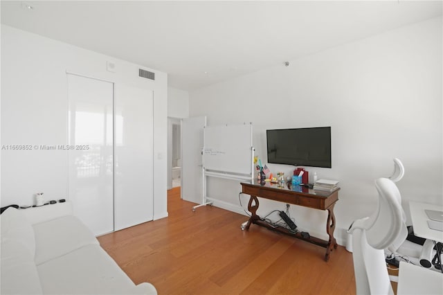 home office featuring wood-type flooring