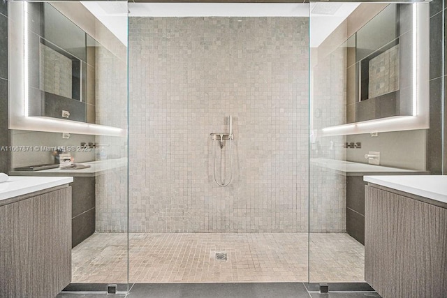 bathroom with tiled shower