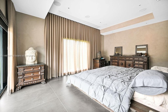 bedroom with concrete floors