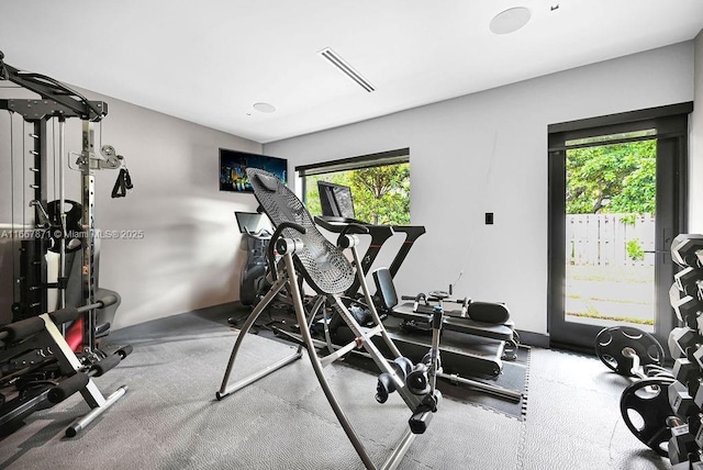 exercise room with plenty of natural light