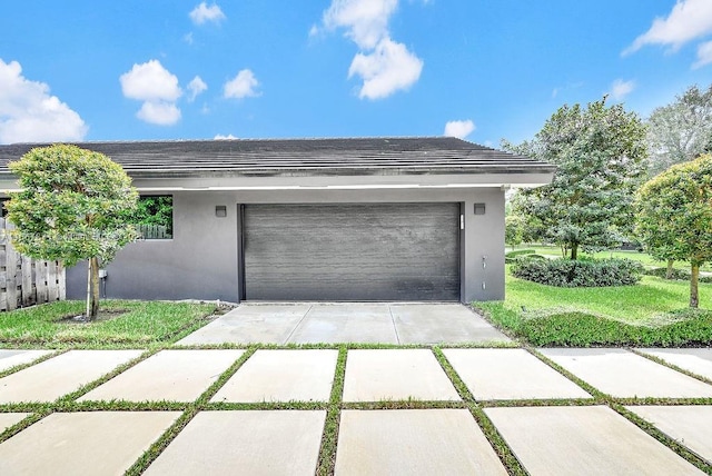 garage with a yard