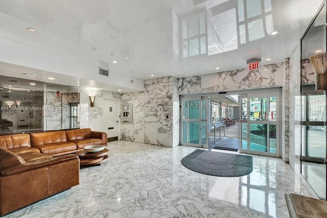 building lobby featuring visible vents