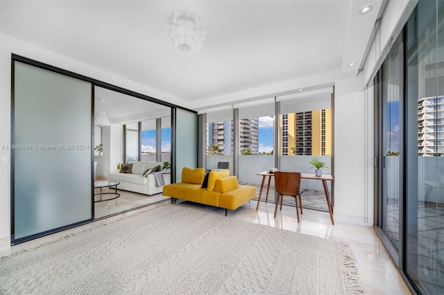 bedroom with floor to ceiling windows