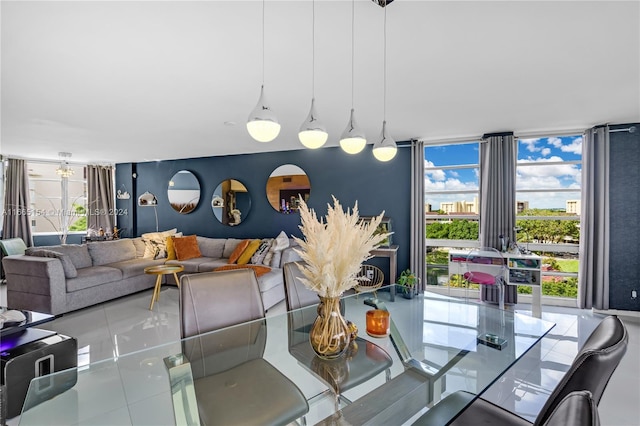 dining room featuring floor to ceiling windows and tile patterned floors