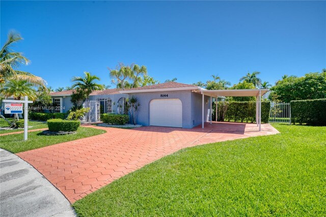 8144 SW 206th Ter, Cutler Bay, FL 33189 - single story home featuring stucco siding, a garage, and decorative driveway