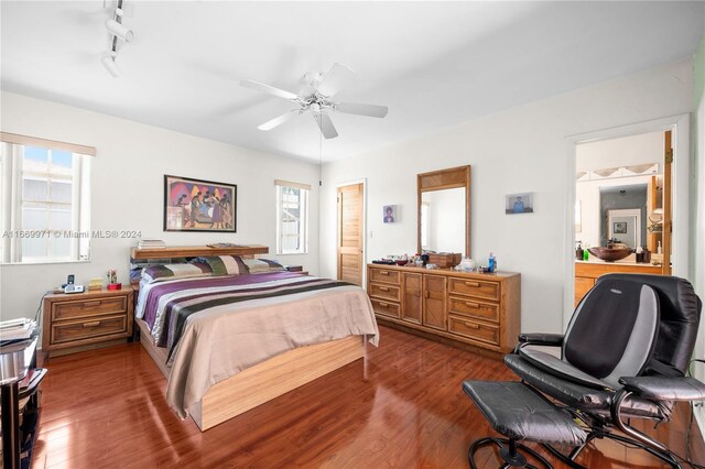 8144 SW 206th Ter, Cutler Bay, FL 33189 - bedroom featuring multiple windows, wood finished floors, and ceiling fan