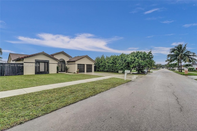 view of front of home with a front lawn