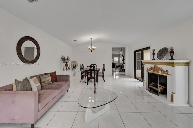 tiled living room featuring a notable chandelier and lofted ceiling