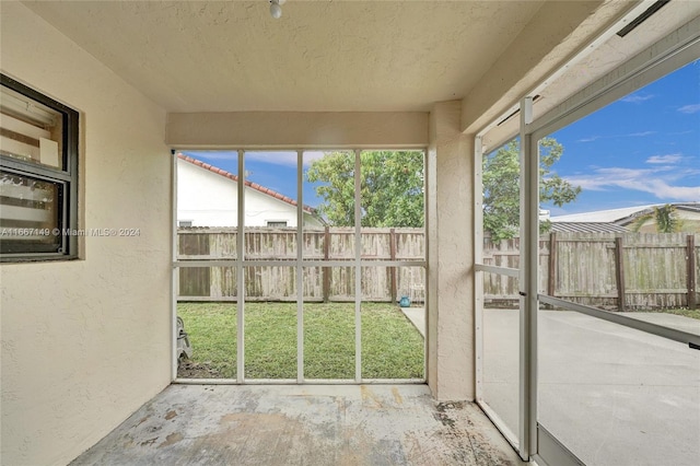 view of unfurnished sunroom