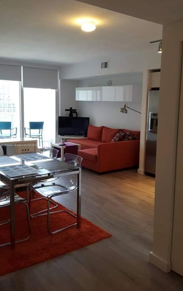 4250 Biscayne Blvd Unit 1206, Miami, FL 33137 - living area with wood finished floors and healthy amount of natural light