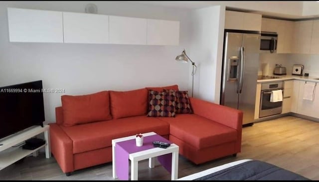 living room with light wood-type flooring